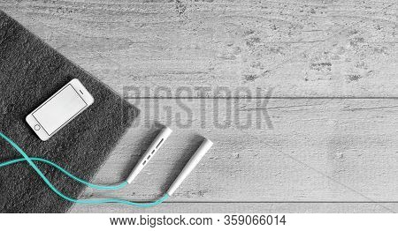 Workout At Home During The Isolation Period Yoga Mat And Jump Rope. Fitness With A Skipping Rope, Sm