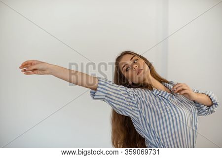 Young Beautiful Girl Is Dancing In The Style Of Contemp.