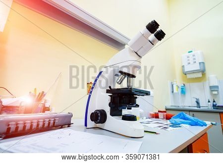 Laboratory Lenses Of Microscope. Laboratory Scientific Research Background. View From The Side.