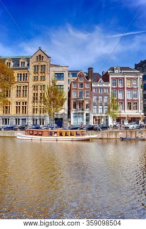 Amsterdam, The Netherlands  - 7 May, 2017, People Having Rest And Relaxing In Amsterdam In The Nethe