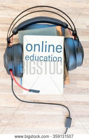 Audio Book Concept. Headphones And Books On Wooden Table. Top View With Copy Space, Online Education