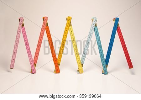 Raimbow Colored Ruler With White Background. Abstract Imagin