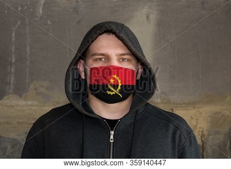 Man Wearing A Hood And A Angola Flag Mask To Protect Him Virus.