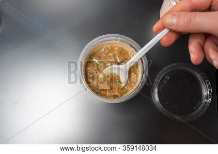 Cooked Soup In A Plastic Glass. To Eat Soup From A Glass.
