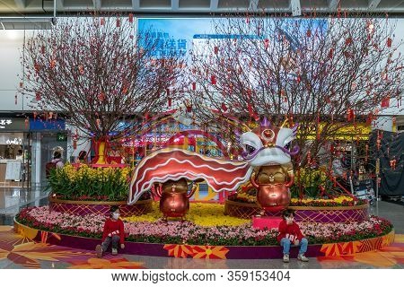 Hong Kong, China - 2020: Children In Medical Masks At Hong Kong International Airport. Two Chinese T