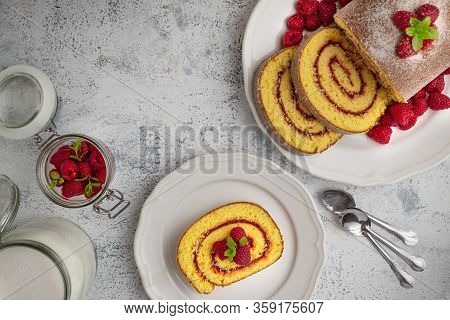 Raspberry Swiss Rolls In Plate With Jam Red Color