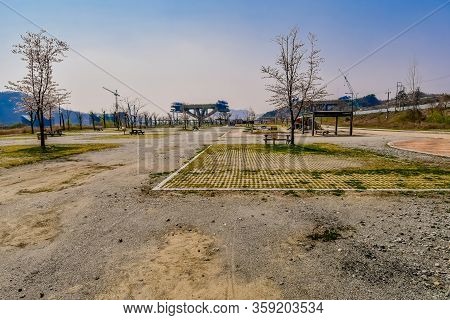 Sejong, South Korea; April 1, 2020: Landscape Of Public Park With New Bridge Under Construction In B
