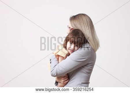 Executive Mom Spends Time With Her Little Daughter Child. Businesswoman Mother, Parent Concept. Keep