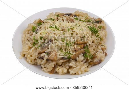 Tasty Appetizing Risotto On A White Plate On A White Background