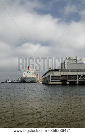 Lng Tanker - Ship At The Gas Unloading Terminal