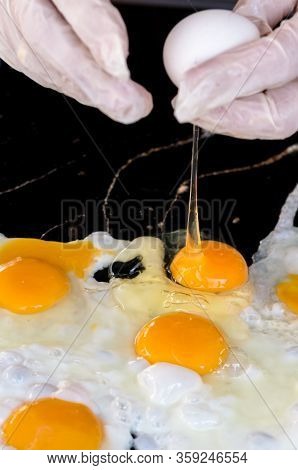 Eggs For Cooking, Top View, Natural Quick Breakfast Of Fresh Eggs. Female Hands Break Eggs For A Qui