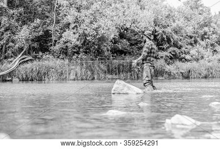 Teach Man To Fish. Fishing Outdoor Sport. Fisherman Catching Fish. Fishing Hobby. Calm And Tranquil.