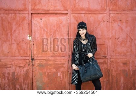 High Fashion Portrait Of Young Elegant Woman Outdoor. Brick Wall, Bag, Bijoux, Glamour Outfit. Backg