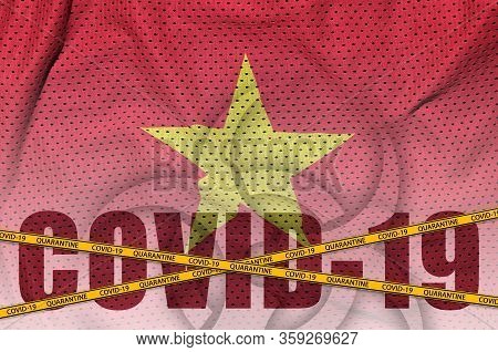 Vietnam Flag And Covid-19 Inscription With Orange Quarantine Border Tape. Coronavirus Or 2019-ncov V