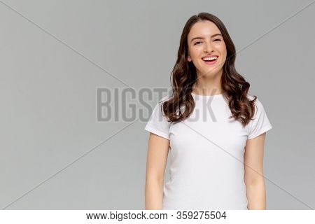 Enjoy Life To Fullest. Portrait Of Attractive Carefree European Female With Ginger Hair, Playing Wit