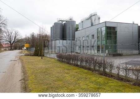 Beer Factory And Street With Metal Constructions.