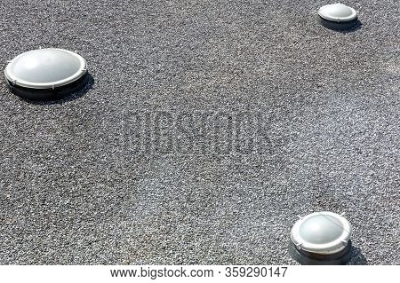 Skylight Windows At Gravel Flat Roof Building