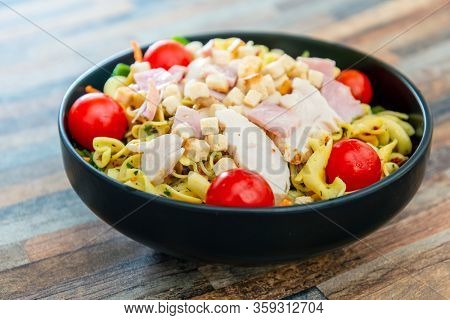 cereal specialties cooked with salad, roasted chicken aiguillette cured with salted and bacon