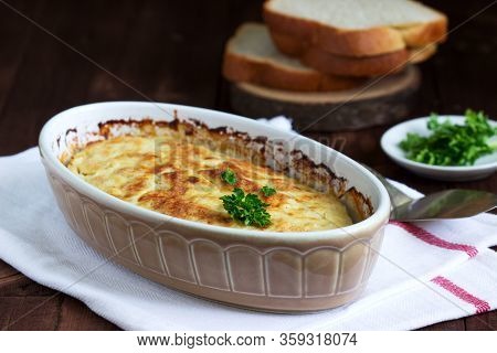 Dietary Souffle Of Minced Meat With Parsley On A Dark Background.