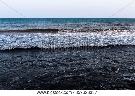 relax on the beach of the resort town with a beautiful view of the waves. Black sea, Betta, Gelendzhik