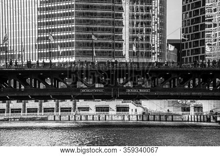 People Crossing The Dusable Bridge In Chicago