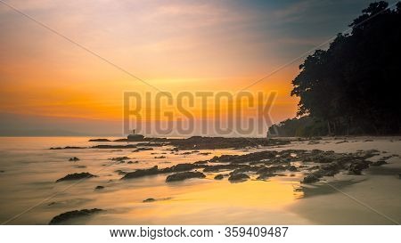 Dramatic Sunset On The Rocky Radhanagar Beach On Havelock Islands, India
