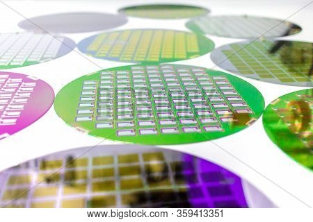Many Silicon Wafers Three Types - Color Wafes With Microchips.color Silicon Wafers With Glare.
