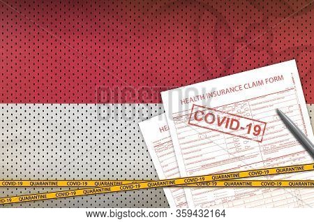 Indonesia Flag And Health Insurance Claim Form With Covid-19 Stamp. Coronavirus Or 2019-ncov Virus C