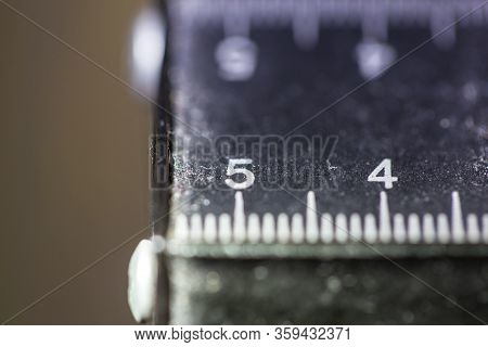 Macro View Of Old And Worn Measuring Instrument Units In Inches Centimeter Milimeter