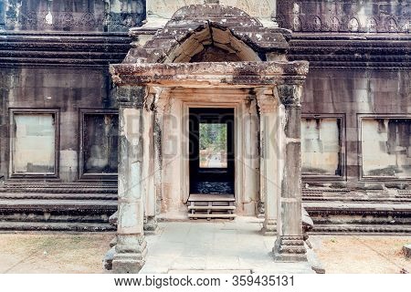 Stone Gate Of Angkor Wat Buildind, 12th Century Temple In Cambodia.