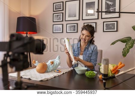 Influencer Making Video About Introducing Soft Food To Baby Nutrition And Preparation Of Fresh Fruit