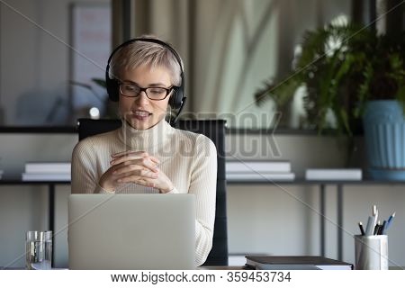 30s Businesswoman Holding Video Call Negotiations Meeting Online.