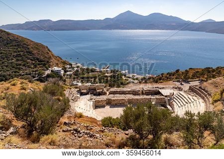 Ancient Greek Theather With Klima Beach In Background, Milos, Greece