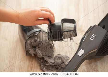 Close Up Of Massively Clogged, Dirty Filter Of Hand Vacuum Cleaner, Dust And Powder On The Vacuum Fi