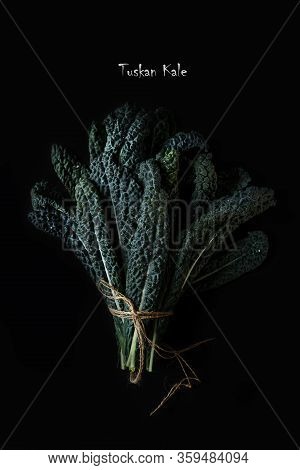 Green Tuskan Kale Leaves On A Dark Background. Healthy Detox Vegetables . Clean Eating And Dieting C