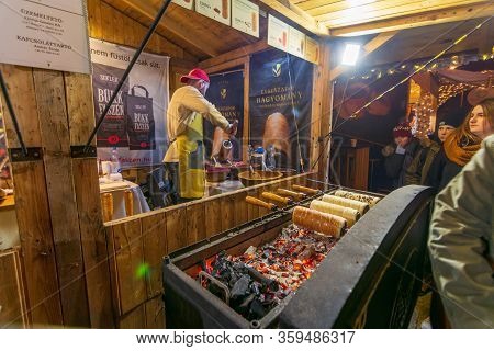 People Enjoying The Colorful Budapest Christmas Maekets, Hungary