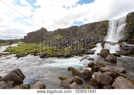 Oxararfoss Waterfall Summer Day View, Thingvellir, Iceland. Icelandic Waterfall