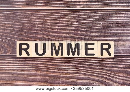 Rummer Word Made With Wood Building Blocks