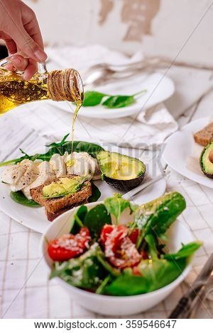 Akavado With Cherry Tomatoes, Mozzarella, Basil With Olive Oil. Healthy Food. Selective Focus. Veget