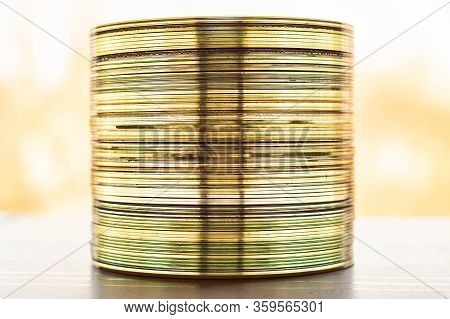 Lot Of Old Cds Stacked On The Windowsill