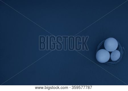 Eggs In A Basket On A Green Background. White Chocolate And White Speckled Eggs. Flat Lay, Copy Spac