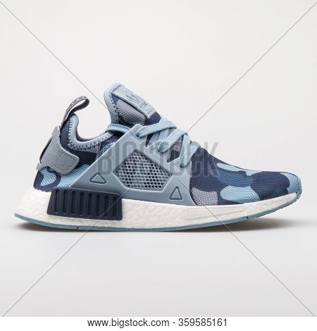 Vienna, Austria - August 6, 2017: Adidas Nmd Xr1 Blue Sneaker On White Background.