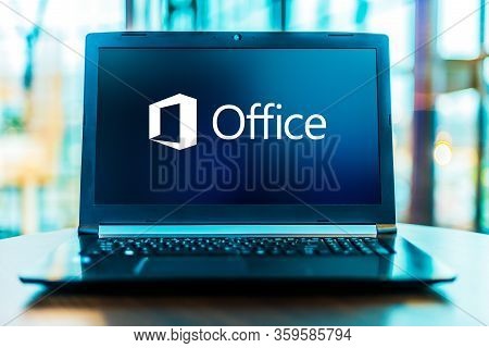 Poznan, Pol - Mar 24, 2020: Laptop Computer Displaying Logo Of Microsoft Office, A Family Of Client 