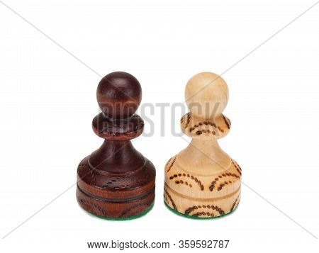 Black And White Chess Pawns On A White Background