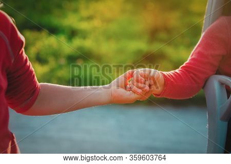 Kids Holding Hands In Sunset Nature, Frandship And Care