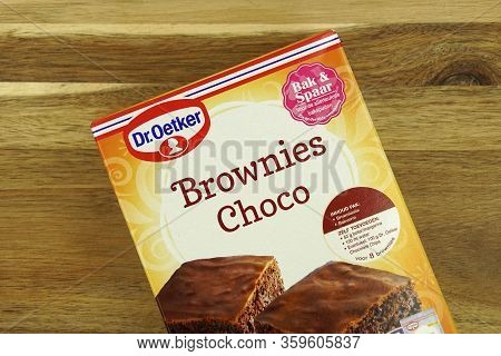 Zaandam, The Netherlands - April 5, 2020: Package Of Dr. Oetker Brownies Choco Against A Wooden Bacl
