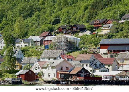 Undredal, Norway - June 08, 2012: View To The Old Traditional Wooden Buildings And Pier From The Aur