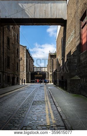 Dublin, Ireland - April 22, 2016: Perspective Street View Of Historic Old Factory Buildings Leading 