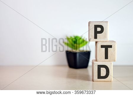Ptd - Text On Wooden Cubes, On Wooden Background. Flower In A Pot