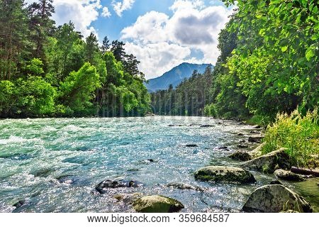 Bolshoy Zelenchuk River In The Caucasus Mountains On A Sunny Day